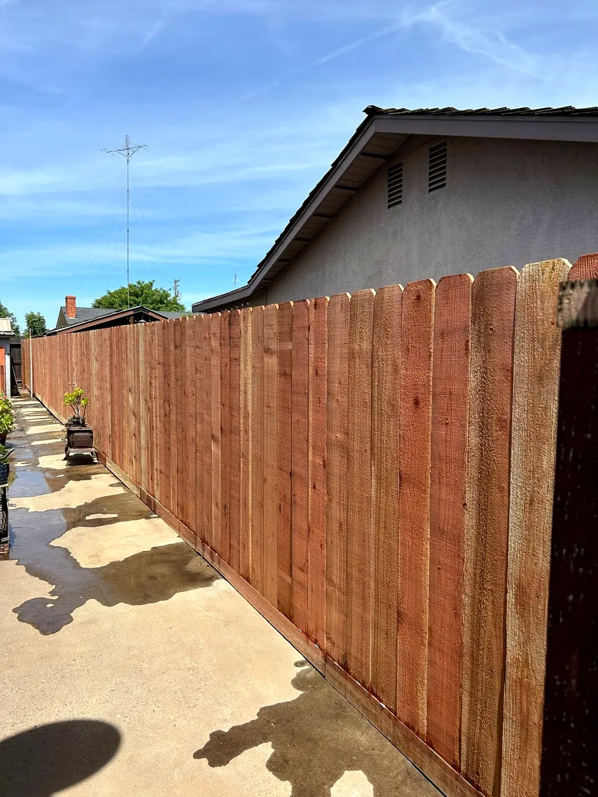 Finished redwood and cedar fence